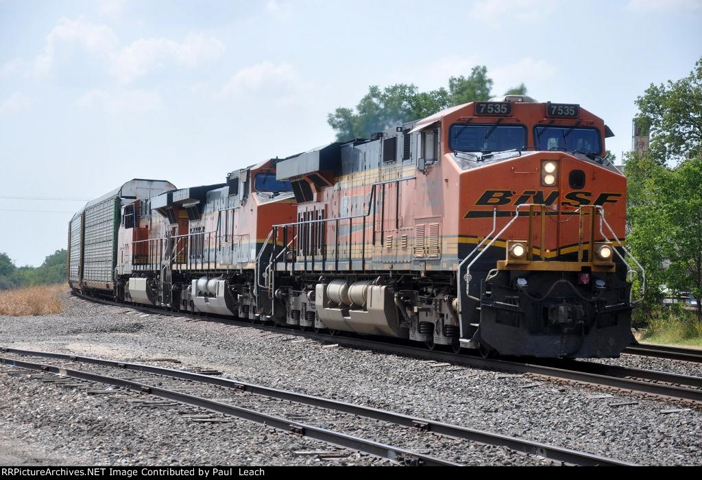 Eastbound vehicle train slows for crew change